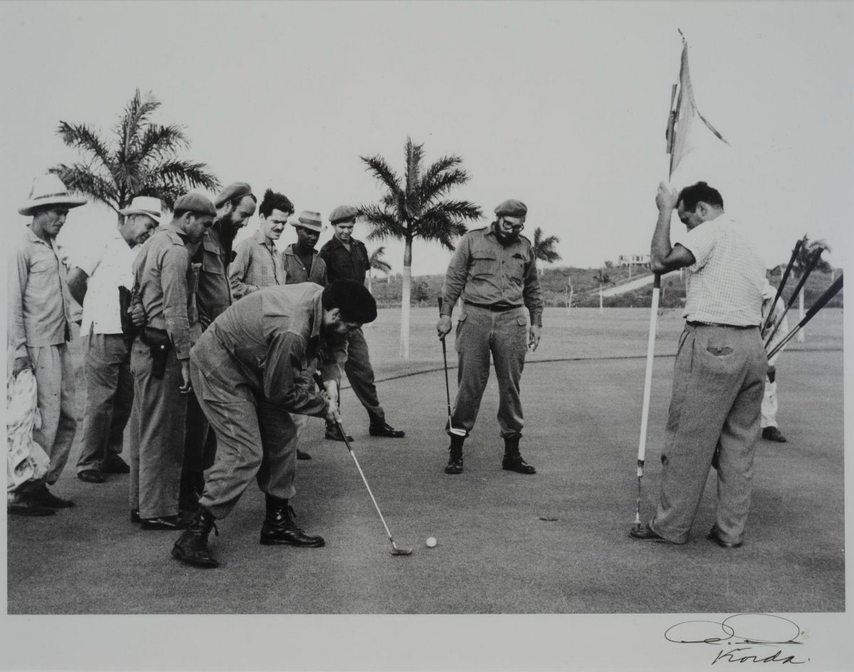Che Guevara and Fidel Castro playing a game of golf