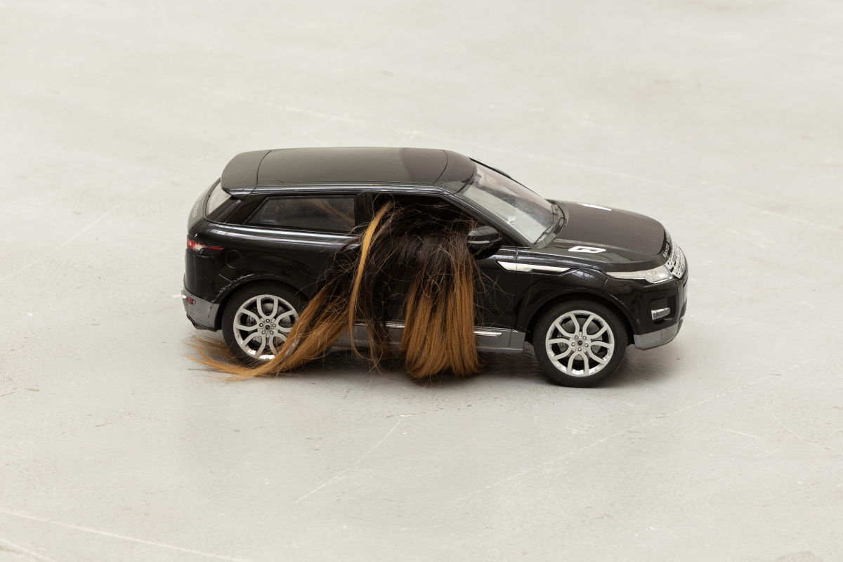 NINA BEIER Automobile, 2017 Two remote control vehicles (black Range Rover) and human hair 17 x 21 x 43 cm each Courtesy the artist and STANDARD (OSLO), Oslo
