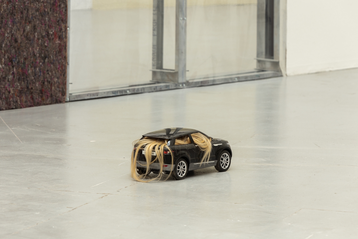 NINA BEIER Automobile, 2017 Two remote control vehicles (black Range Rover) and human hair 17 x 21 x 43 cm each Courtesy the artist and STANDARD (OSLO), Oslo