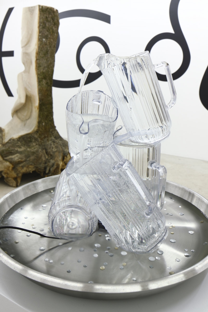 Water. Plastic jugs, plastic rhinestones, steel, water pump, plinth, 62 cm x 52 ø cm x 90 ø. 2018
